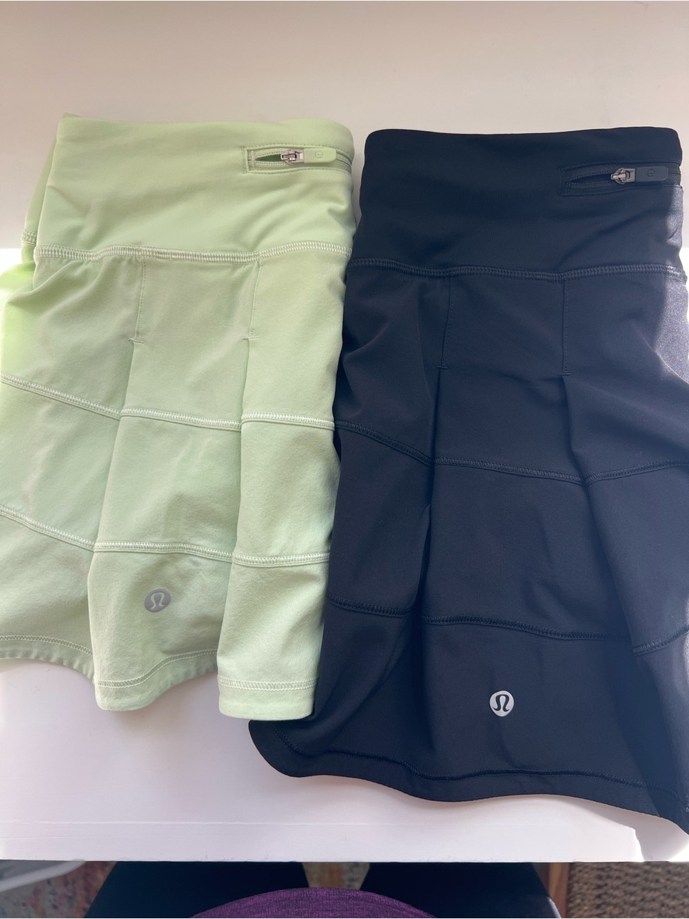 Two lululemon athletica skorts in Mint Green and Black